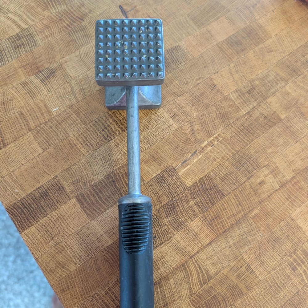 Metal Meat Tenderizer with Black Handle